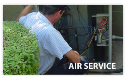 HVAC expert repairing air conditioner
